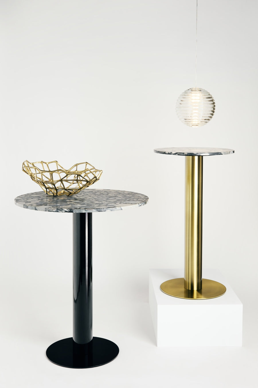 Side table tube stone marble with a brass base