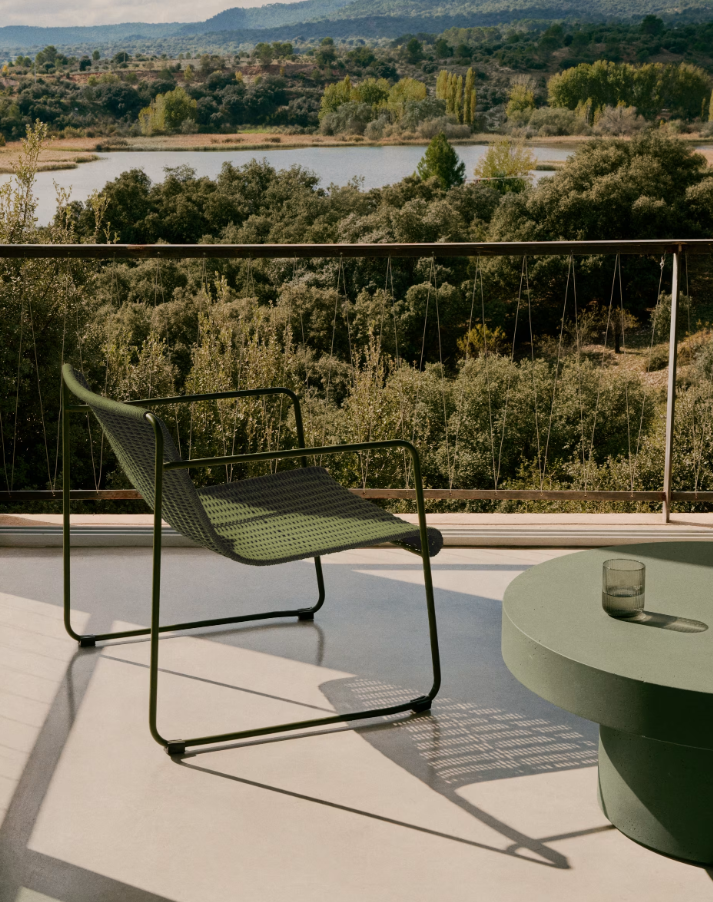 Exterior armchair Maurina Zielony with a green steel base