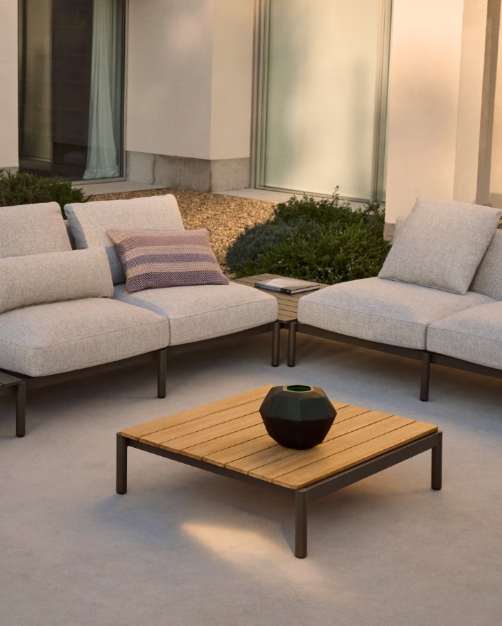 Sorells external coffee table with a dark green base