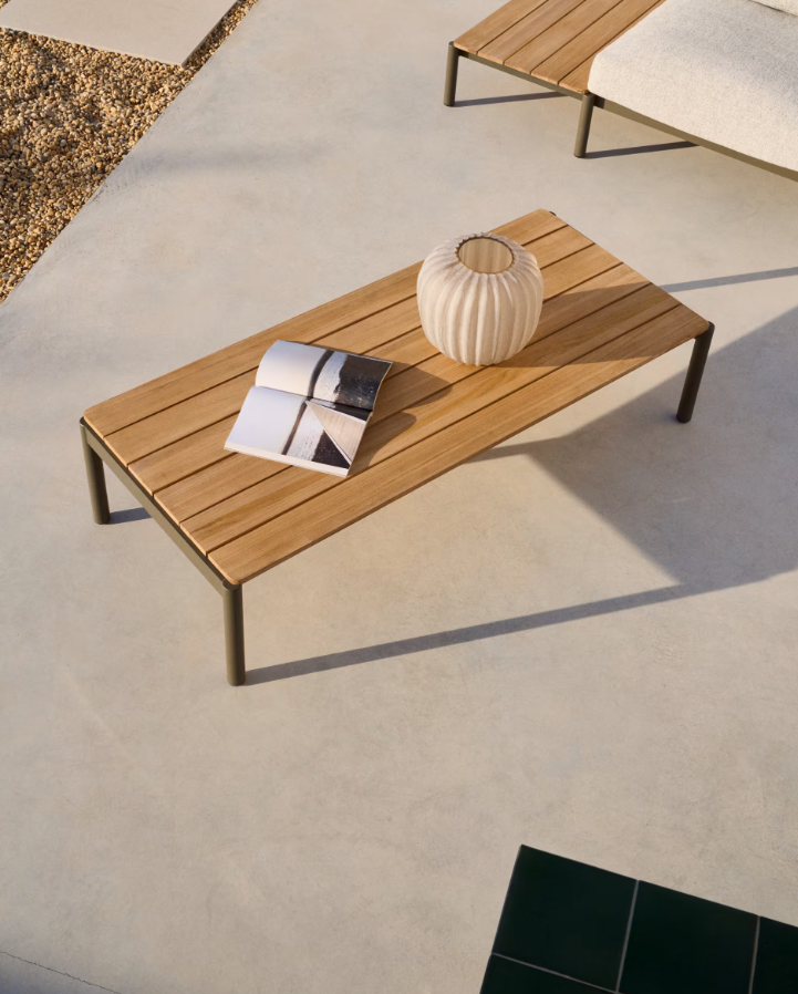 Sorells external coffee table with a dark green base