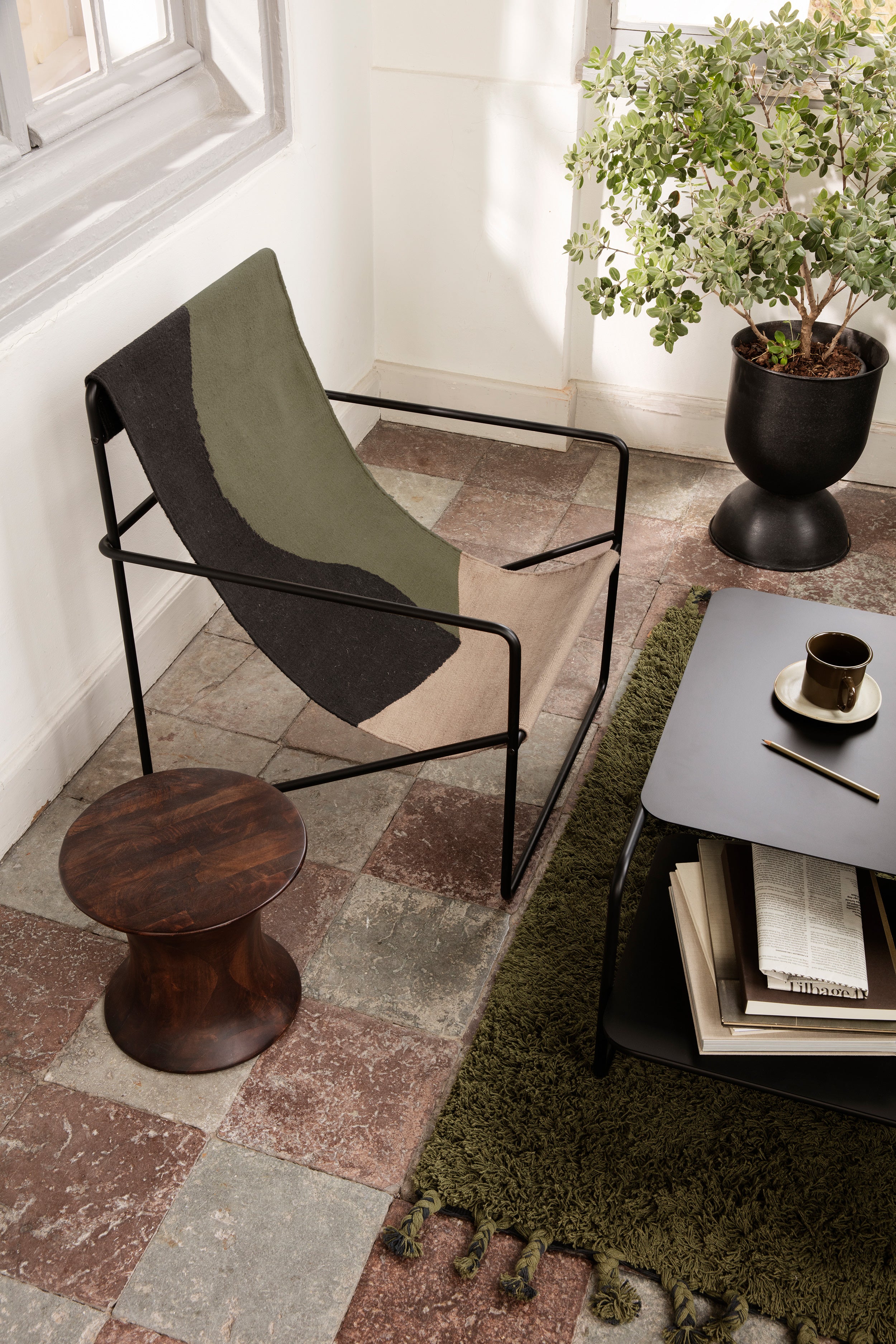 Desert olive-brown garden armchair with a black base