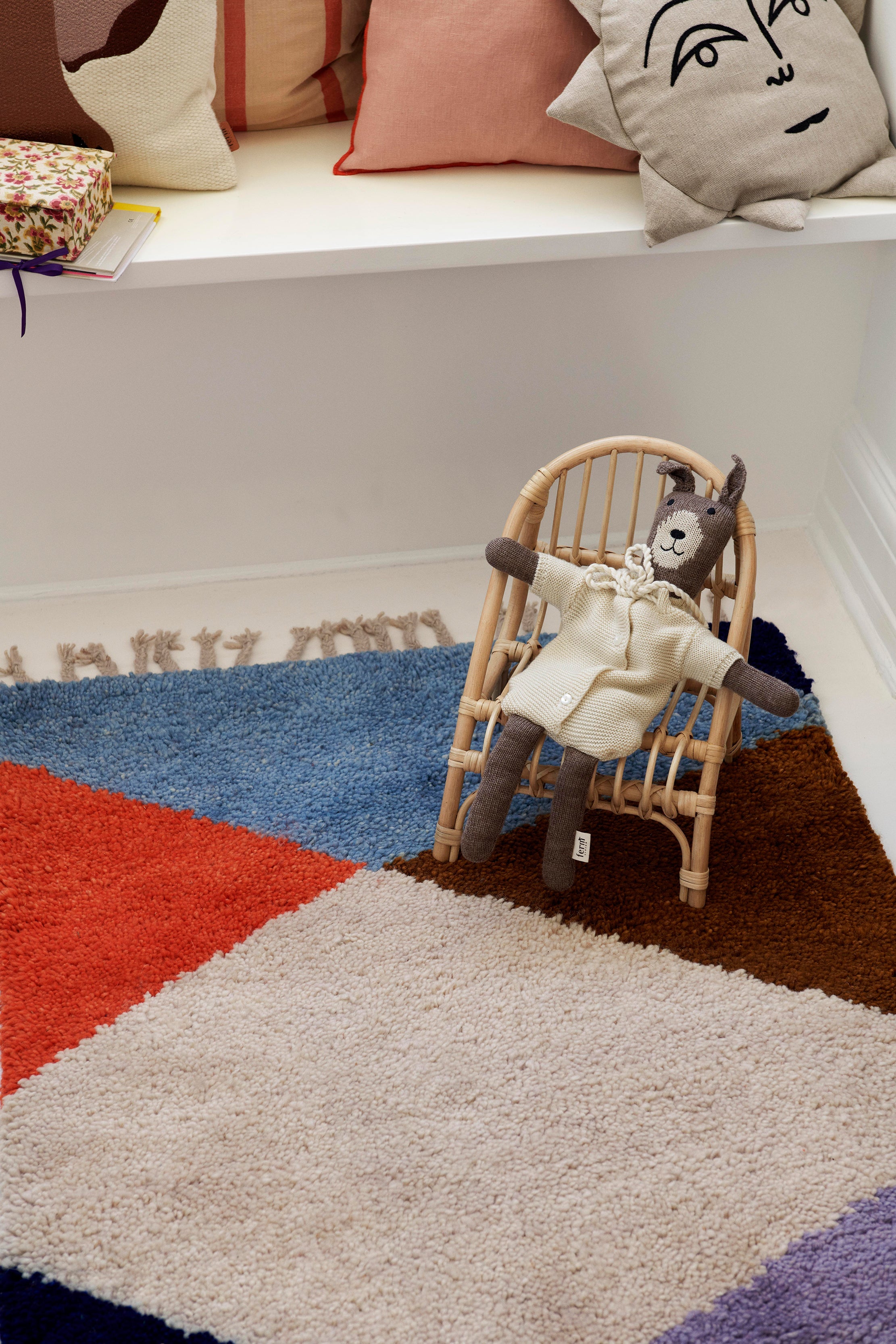 Harlequin woven carpet graphic theme