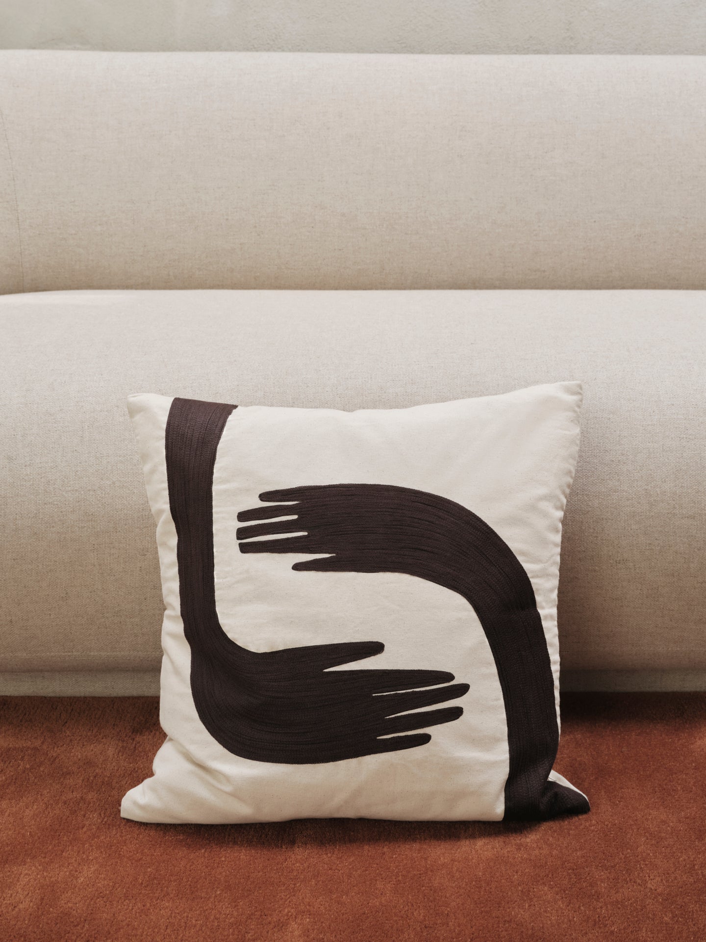 Beige pillow with coffee