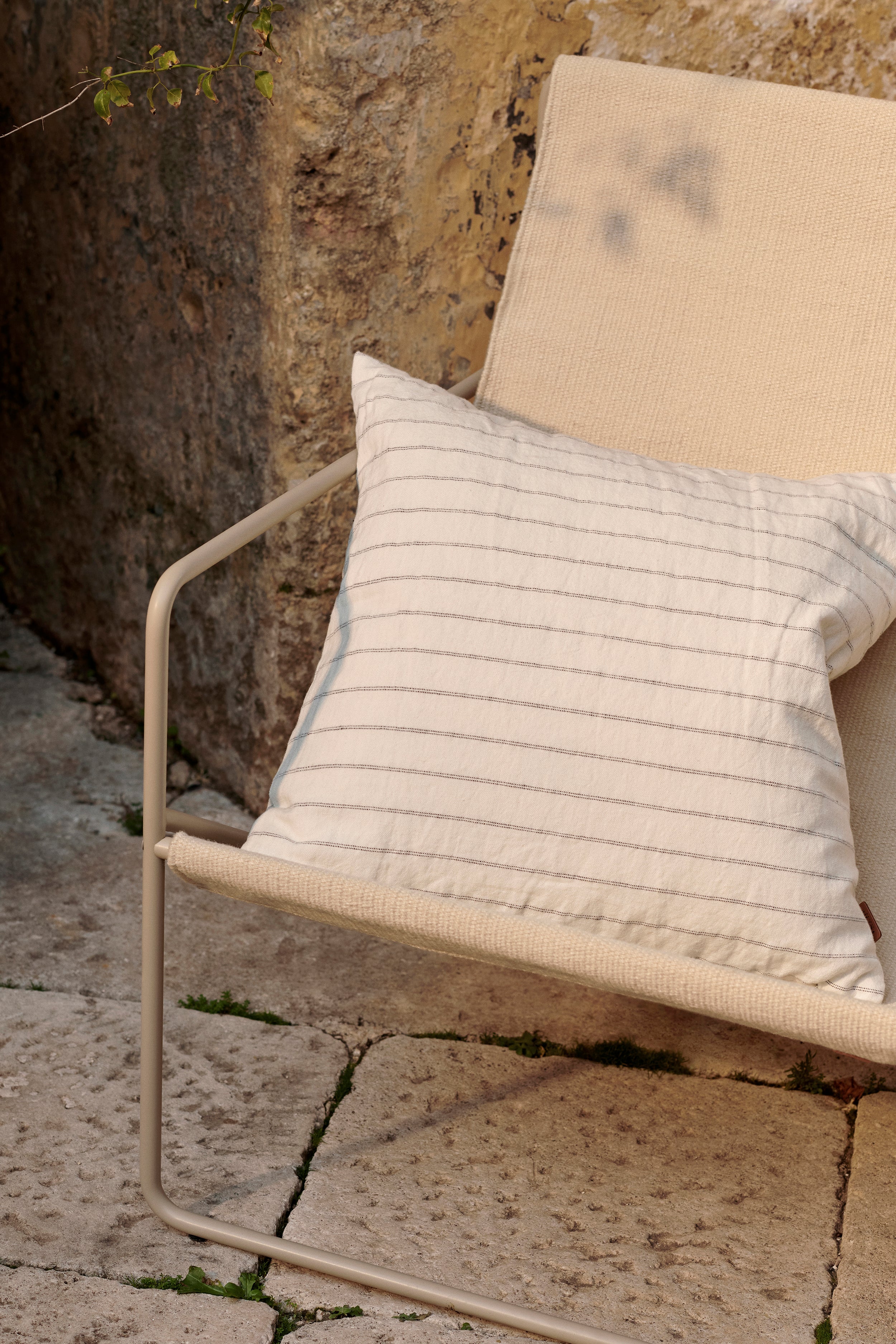 Desert beige garden chair with a beige base