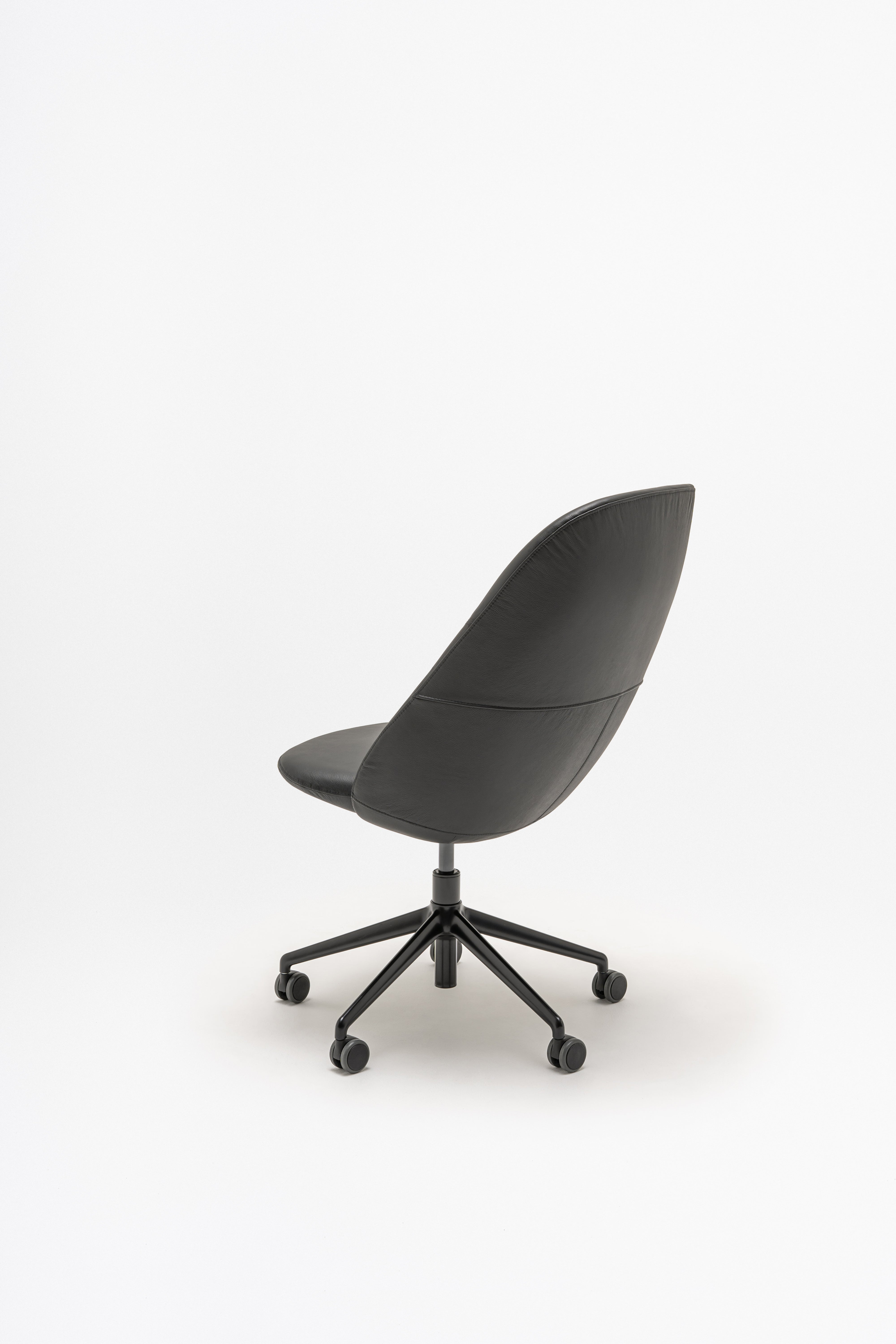 Conference armchair A regulated parallel base with wheels for a soft surface