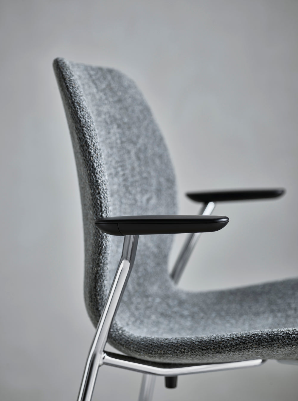 SEED chair upholstered with a black base