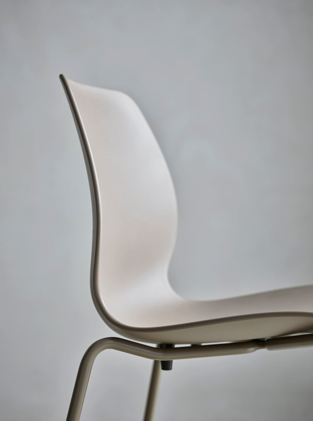 Seed white chair with a steel base