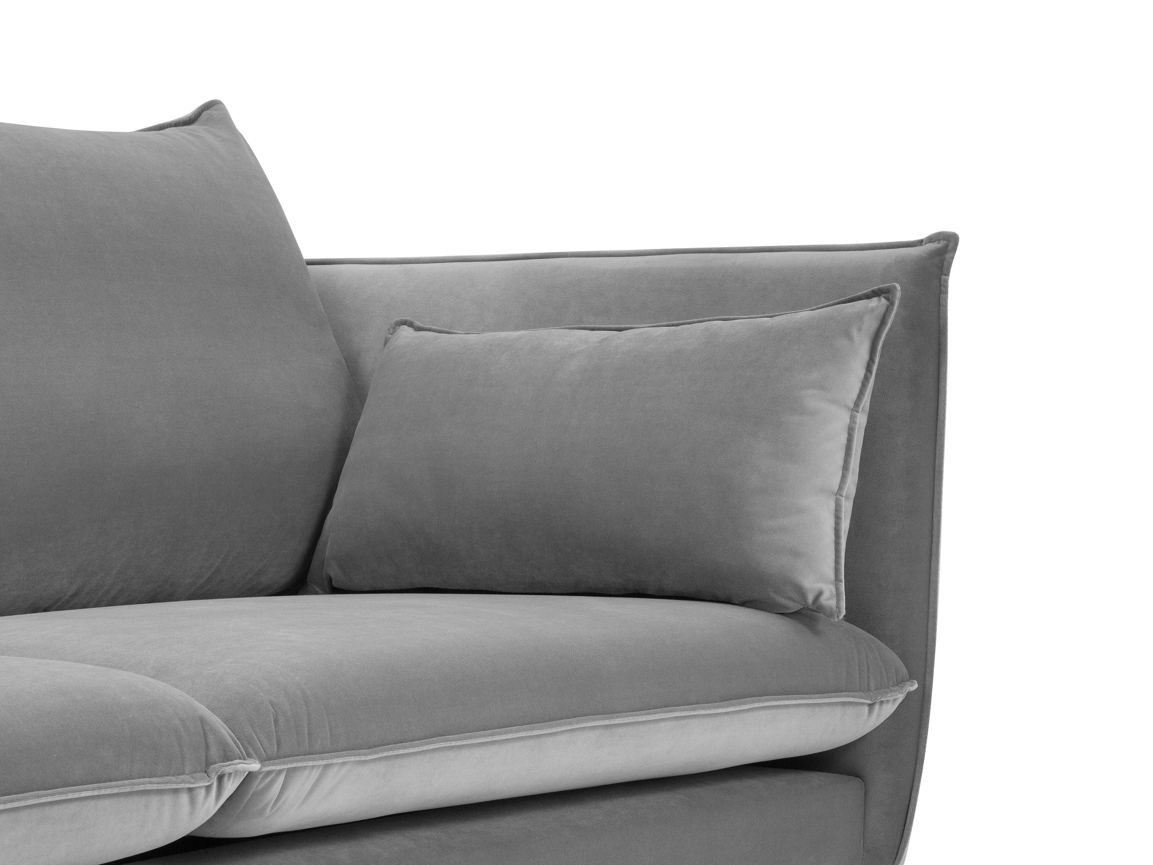 jasnoszara sofa z czarną podstawą