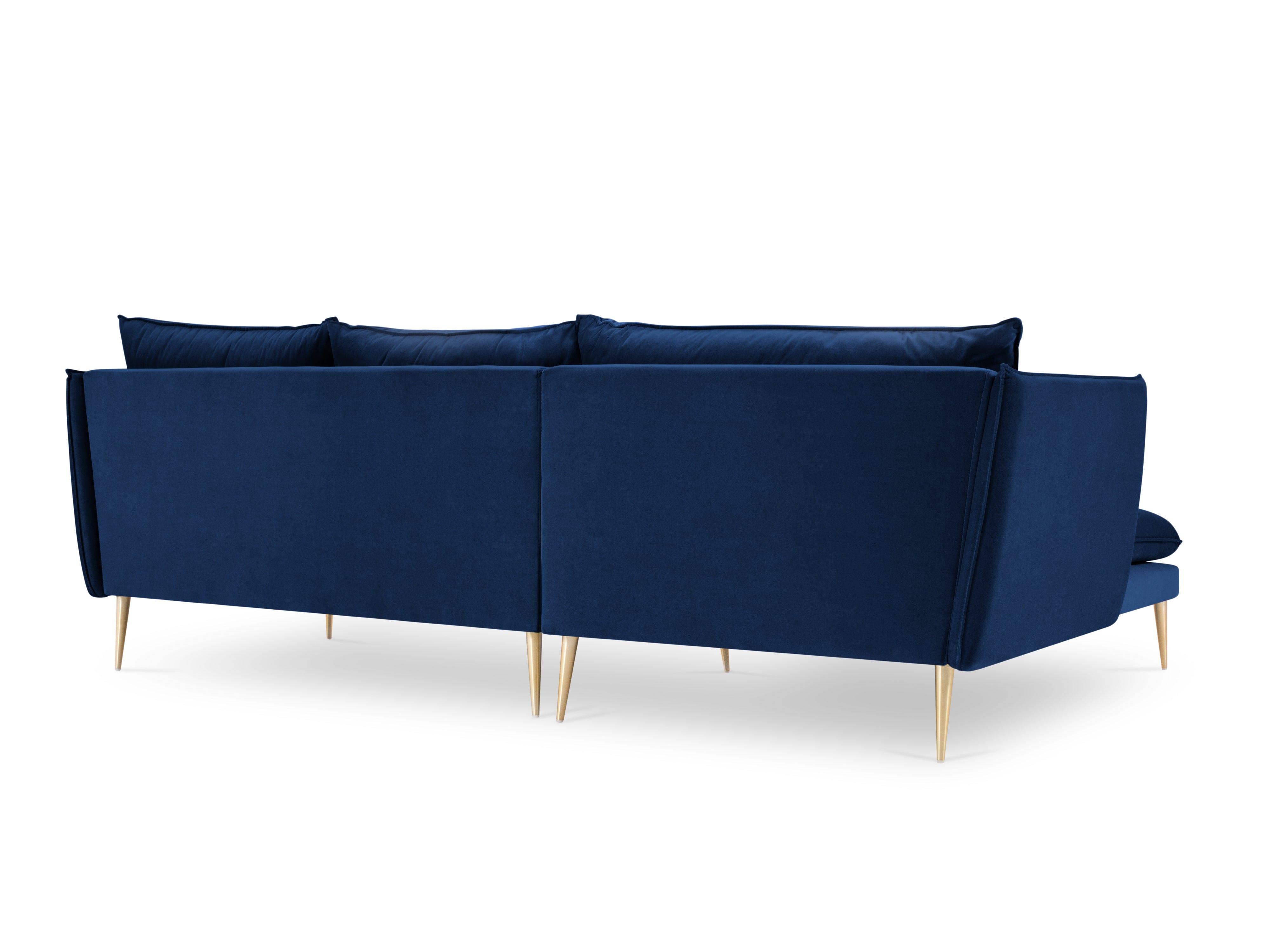 niebieska sofa ze złotą podstawą 